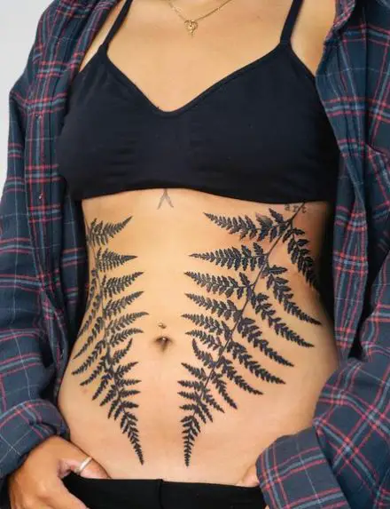 Black Fern Plant Stomach Tattoo Piece