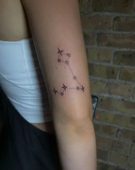 Black Ink Pisces Constellation Arm Tattoo
