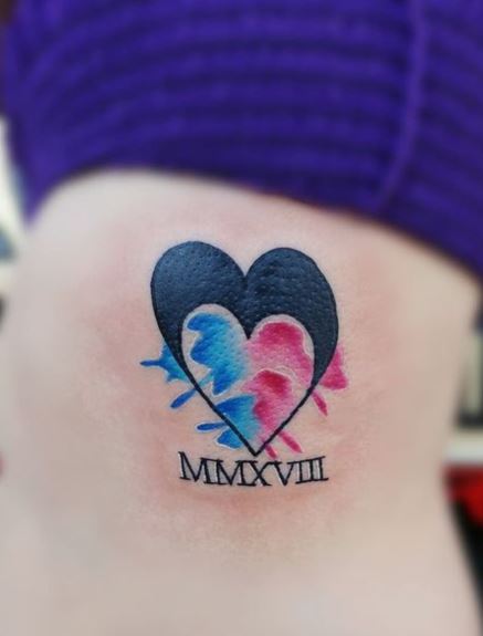 Black Ink and Water Colored Combined Heart Rib Tattoo