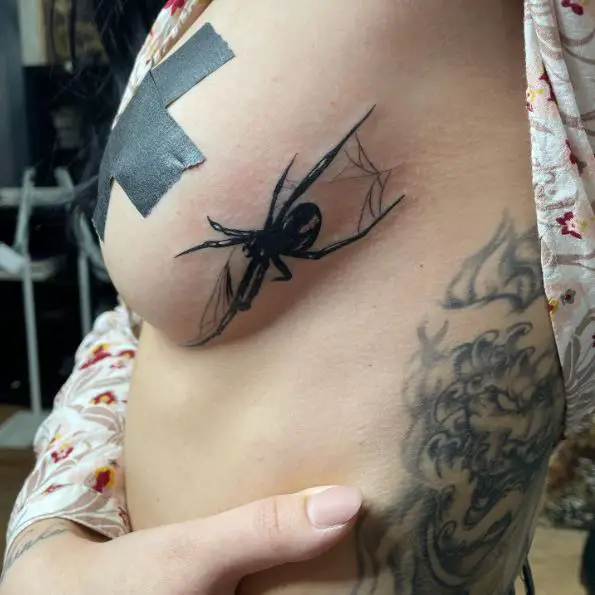 Black Spider Breast Tattoo