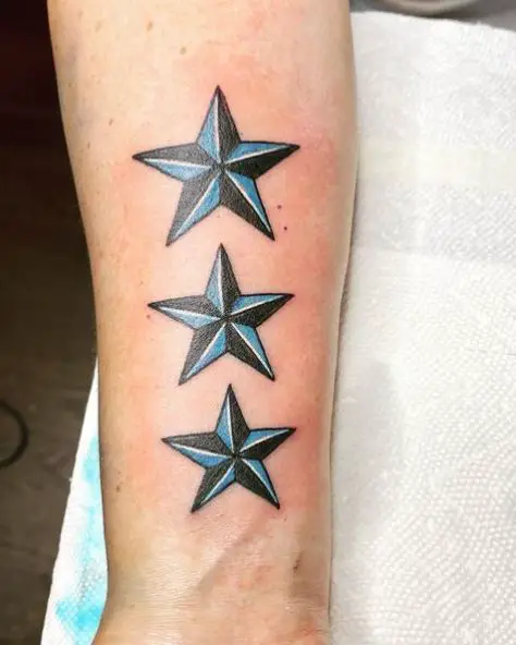Black and Blue Bunch of Nautical Stars Tattoo