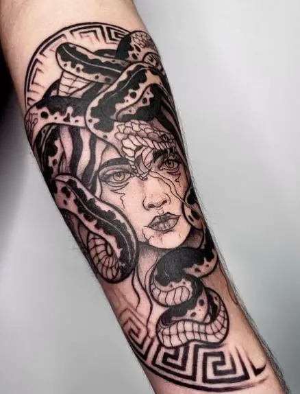 Black and Grey Evil Medusa Forearm Tattoo
