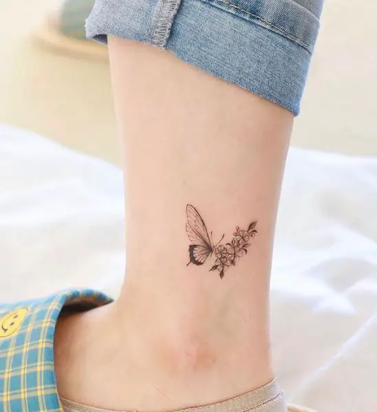 Black and Grey Forget Me Nots and Butterfly Ankle Tattoo
