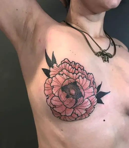 Black and Orange Flower Breast Tattoo
