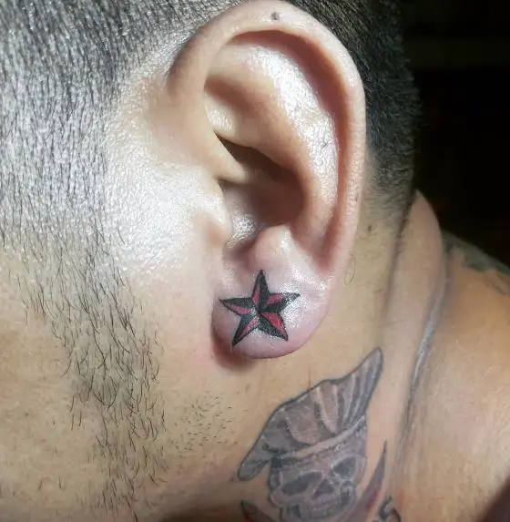 Black and Red Star Ear Tattoo