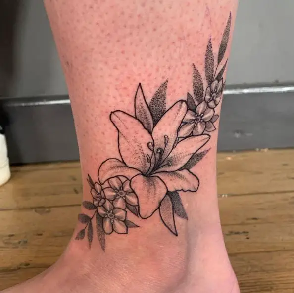 Blackwork Lily and Forget Me Nots Leg Tattoo