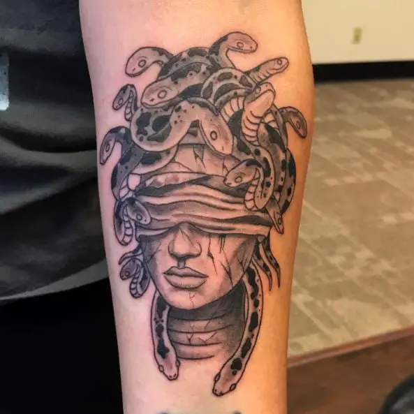 Blindfolded Patterned Medusa Forearm Tattoo