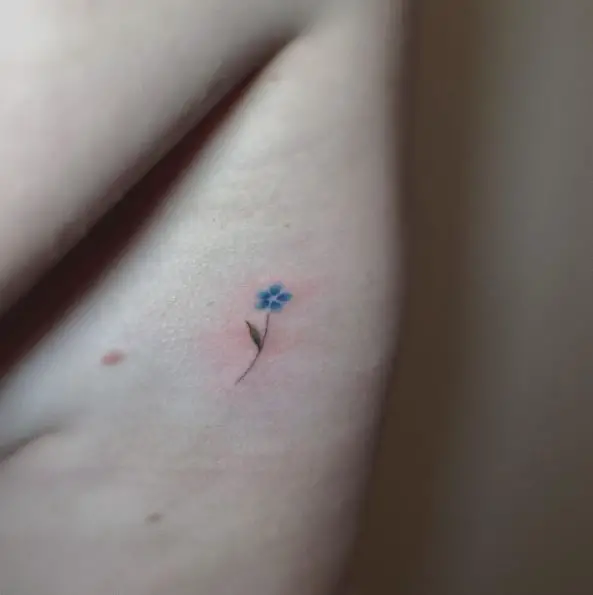 Blue Flower with Green Leaf Tattoo