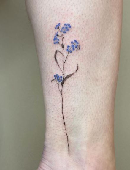 Blue Forget Me Nots Floral Leg Tattoo