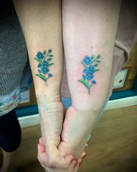 Blue and Green Forget Me Nots Hand Tattoo