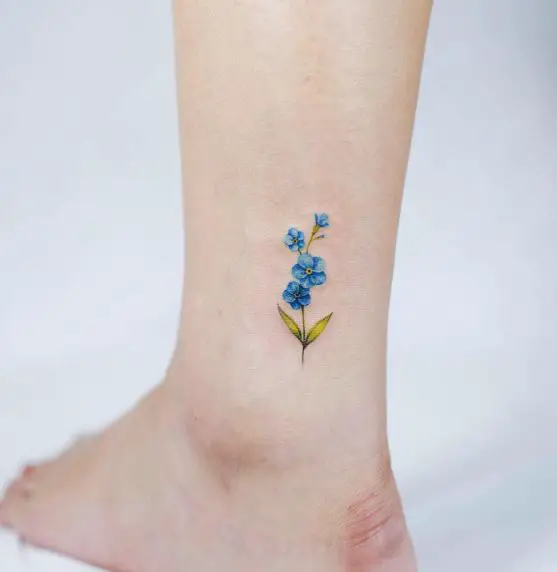 Blue and Green Forget Me Nots Leg Tattoo