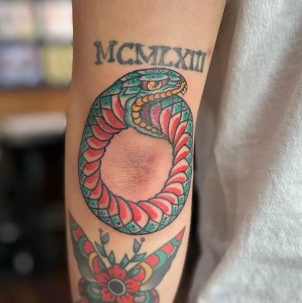 Blue and Pink Ouroboros Tattoo