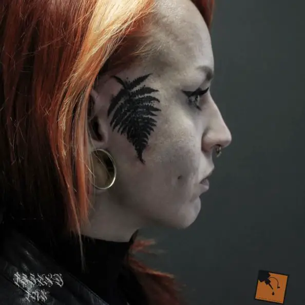 Bold Black Fern Leaves Face Tattoo Piece