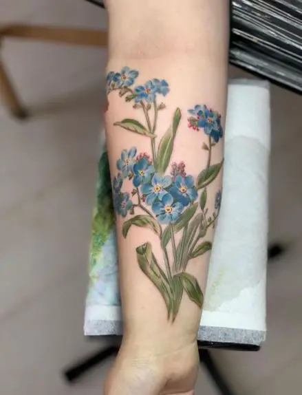 Bunch of Forget Me Nots Forearm Tattoo
