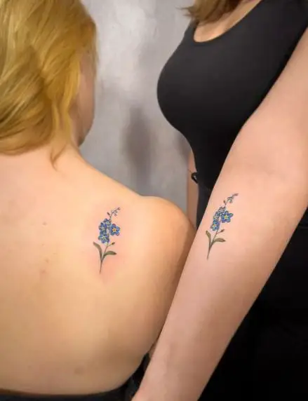 Colored Forget Me Nots Shoulder and Hand Tattoo