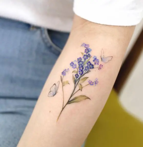 Colored Forget Me Nots and Flying Twin Butterflies Tattoo