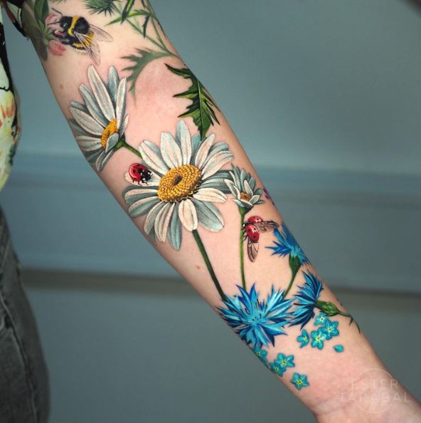 Daisy and Forget-Me-Not Tattoo with Lady Bugs