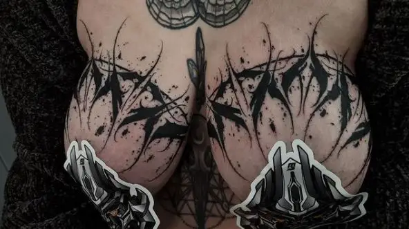 Dark Calligraphy Breast Tattoo Piece