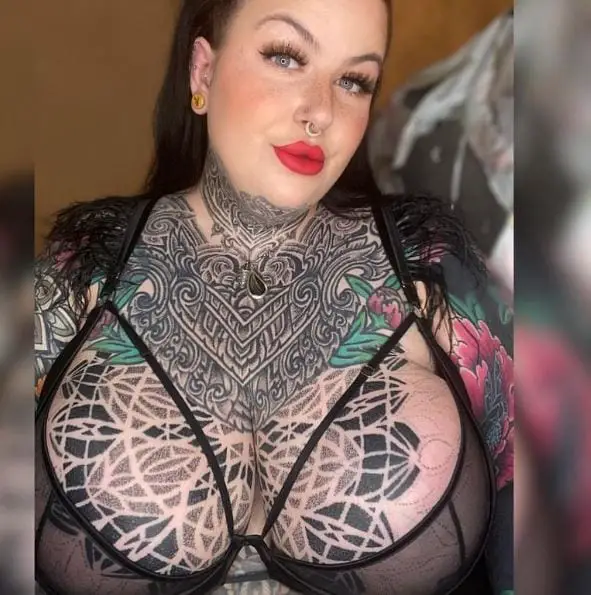 Detailed Artwork Breast Tattoo Piece