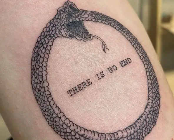 Dotted Sketch Style Ouroboros Lettering Tattoo