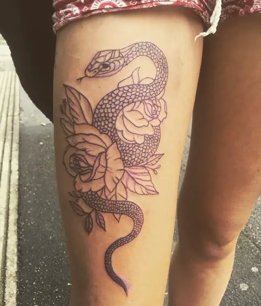 Dotted Snake and Flowers Thigh Tattoo