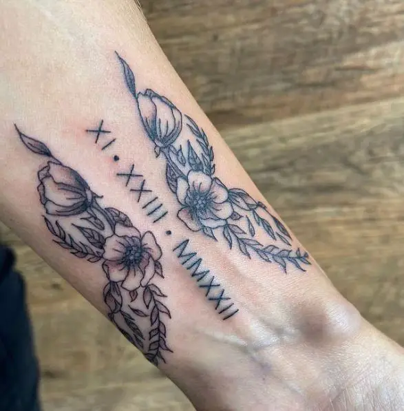 Floral Butterfly Wings with Roman Numerals Wrist Tattoo