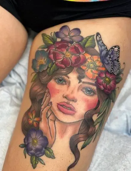 Floral Crowned Girl Face Thigh Tattoo