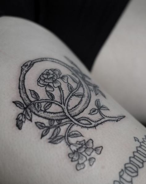 Floral Plants and Ouroboros Thigh Tattoo