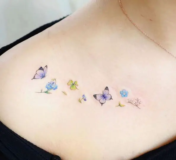 Forget Me Not Flowers and Butterflies Collarbone Tattoo
