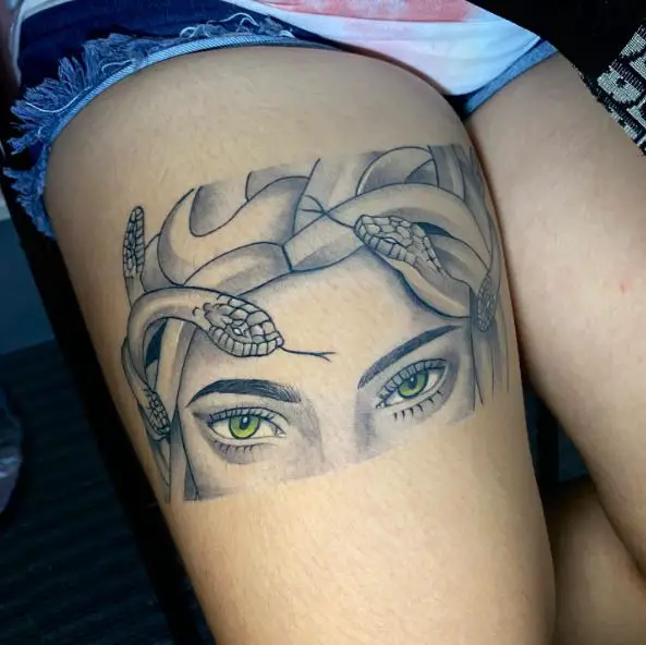 Green Eye Half Head Medusa Tattoo