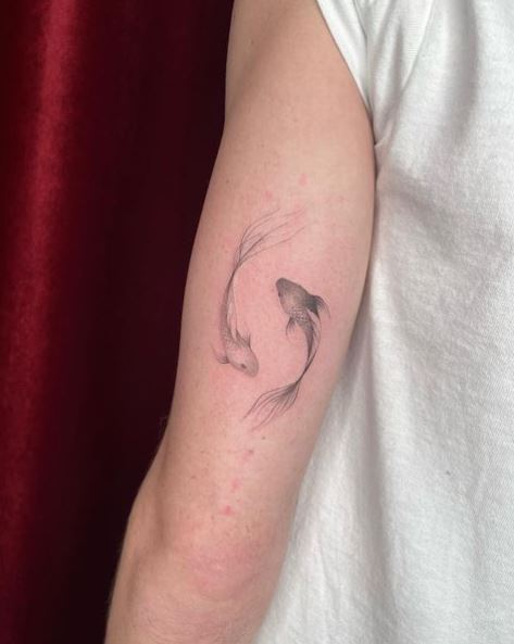 Grey Shade Two Pisces Fish Arm Tattoo