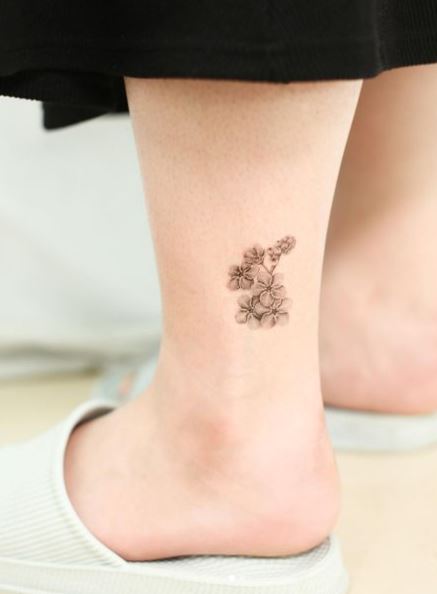 Greyscale Forget Me Not Flower Leg Tattoo