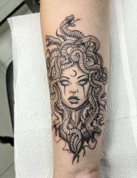 Greyscale Medusa Tattoo with a Moon Symbol