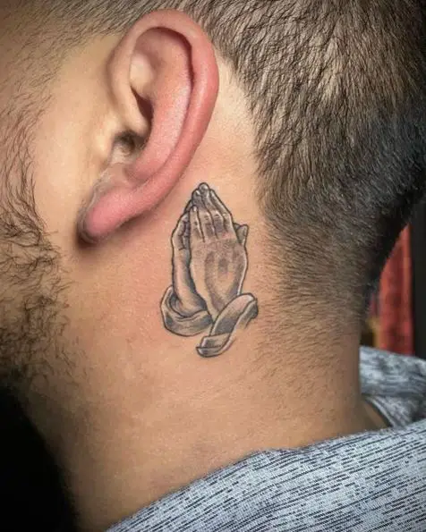 Greyscale Small Praying Hands Tattoo Behind the Ear