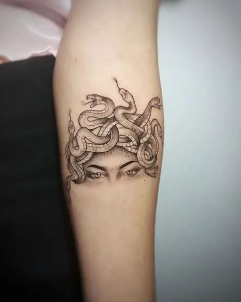 Half Head Medusa Forearm Tattoo