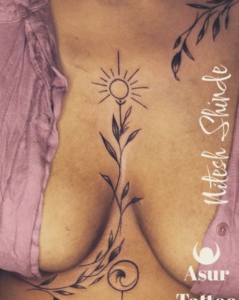 Leaves, Sun and Moon Breast Tattoo
