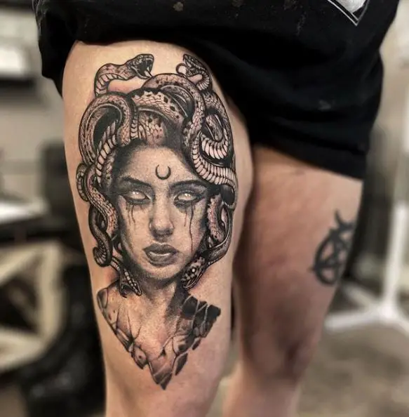 Medusa Face with Moon Thigh Tattoo
