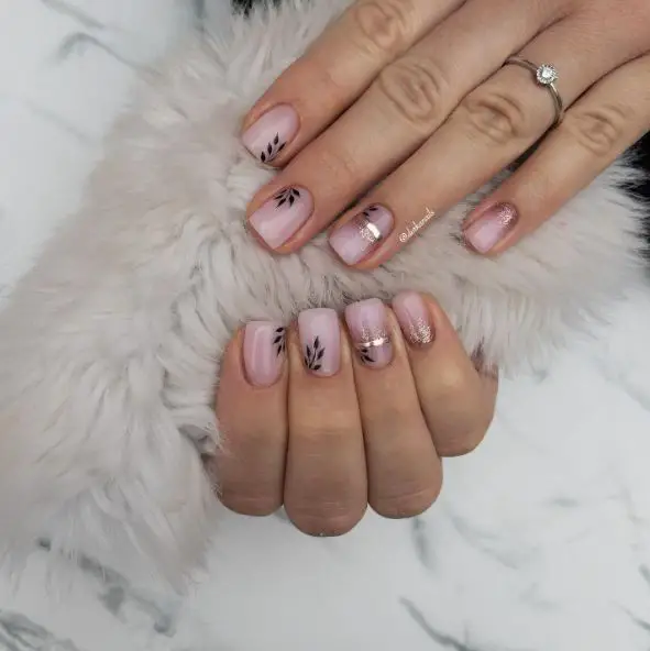 Milky Pink Nails with Rose Gold Glitter and Black Leaf Print