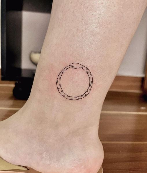 ouroboros in Fineline Tattoos  Search in 13M Tattoos Now  Tattoodo