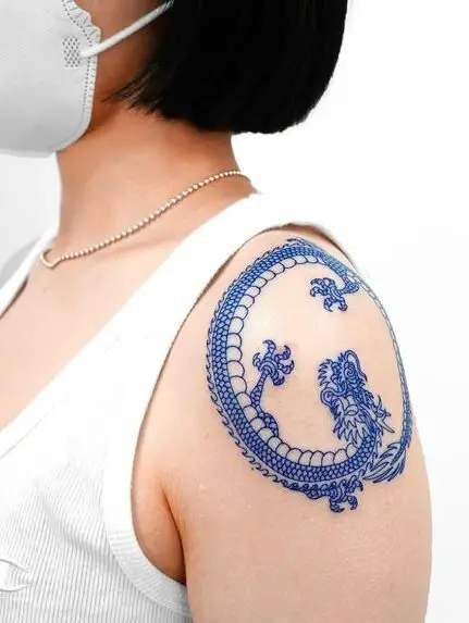 Ouroboros Blue Dragon Arm Tattoo