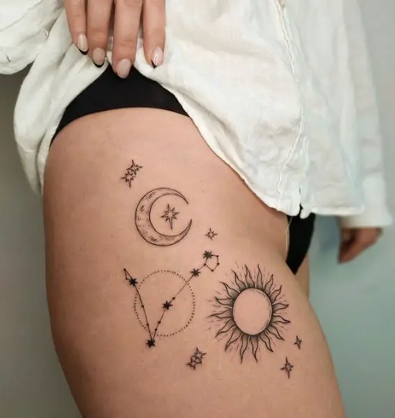 Pisces Symbol and Other Celestial Objects Thigh Tattoo