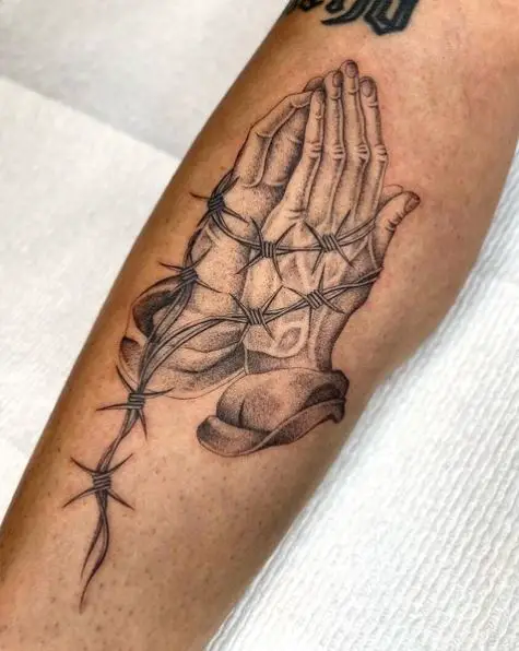 Praying Hands Tied with Barbed Wire Tattoo Piece