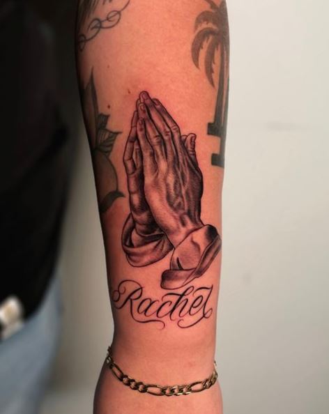 Praying Hands and Script Forearm Tattoo