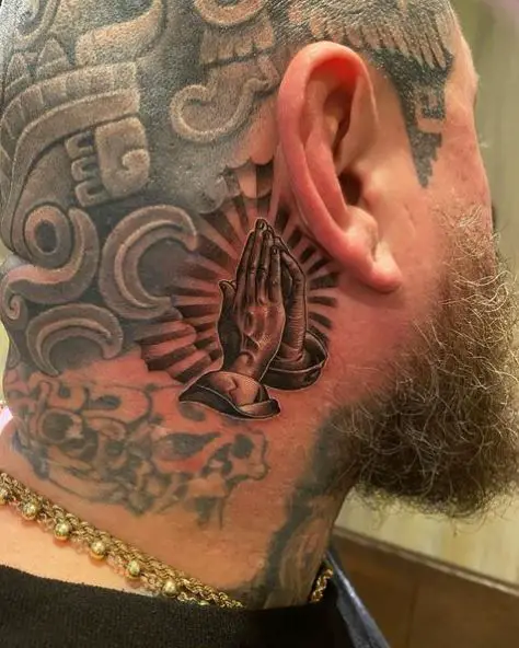 Praying Hands with Halo Tattoo Behind the Ear