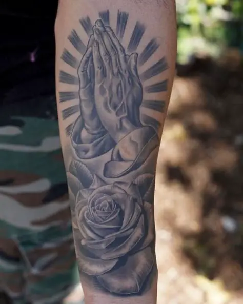 Praying Hands with Halo and Rose Forearm Tattoo