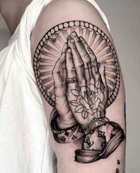 Realistic Praying Hands with a Rose Arm Tattoo