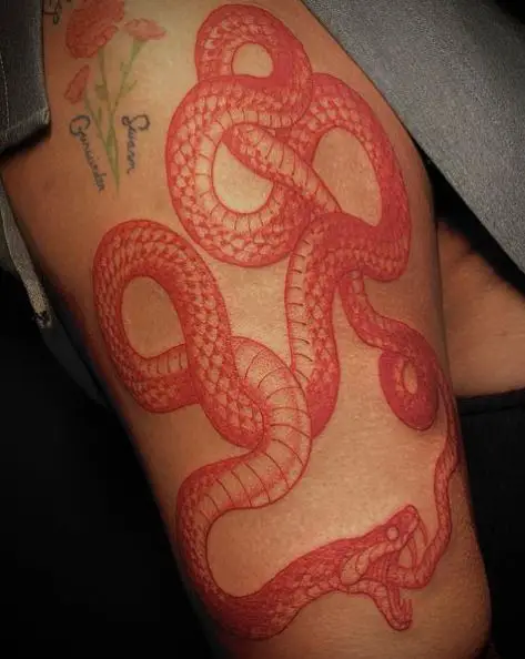 Red Ink Ouroboros Tattoo