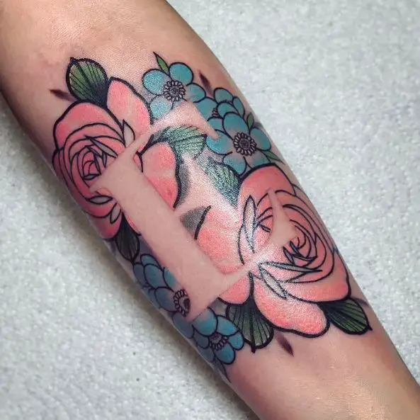 Rose and Forget-Me-Nots Forearm Tattoo