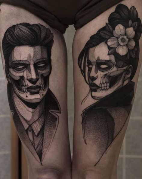 Skull Faces Portrait Thigh Tattoo
