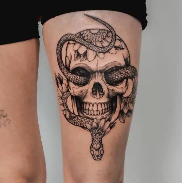 Skull and Floral Snake Thigh Tattoo